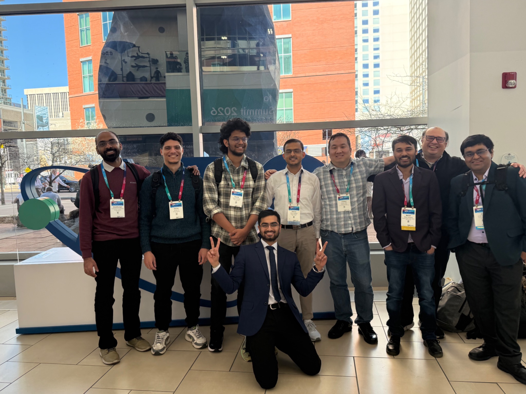 Piyush with research colleagues at a physics conference